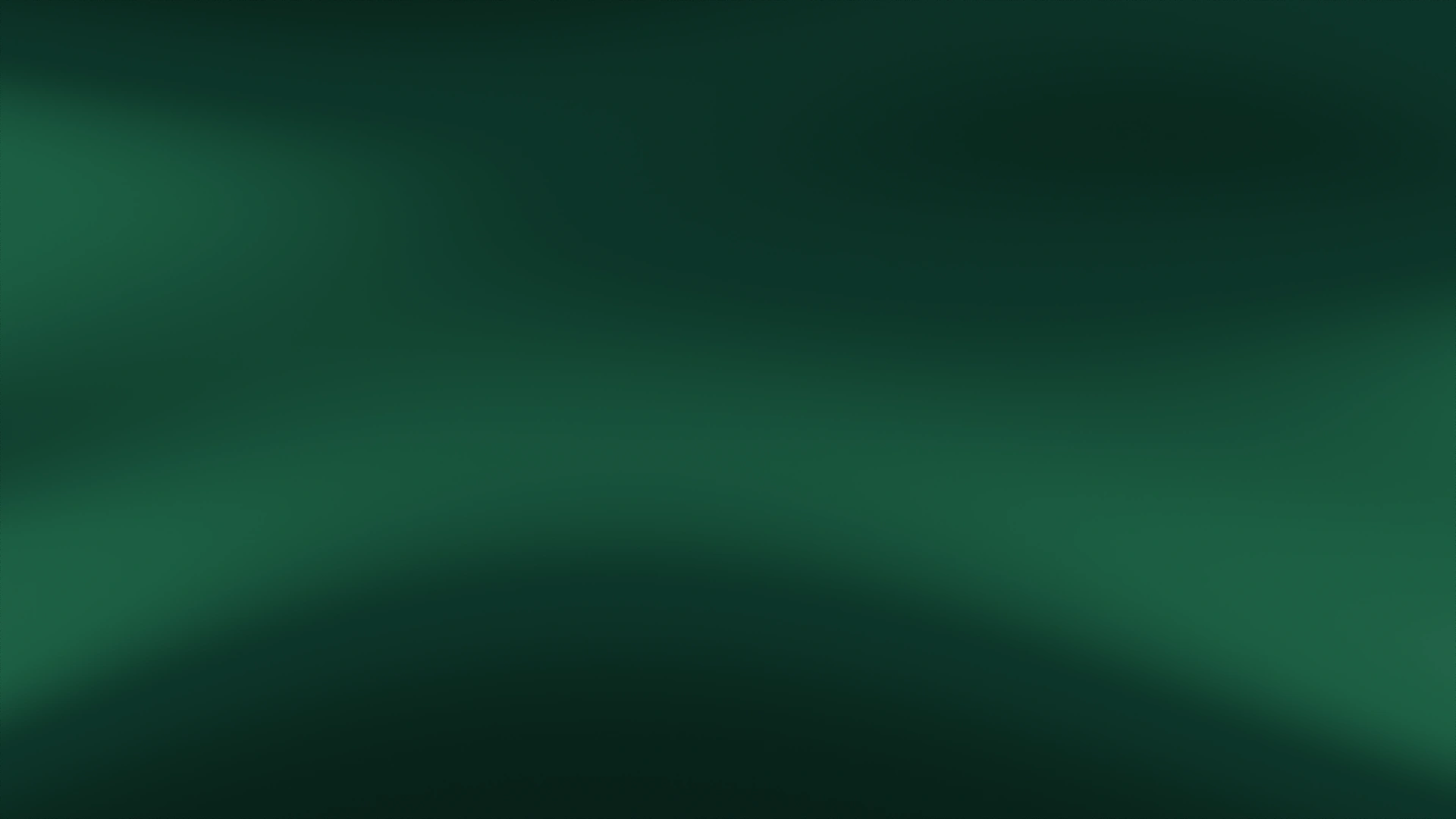 Soft veils of emerald light drifting across a dark background